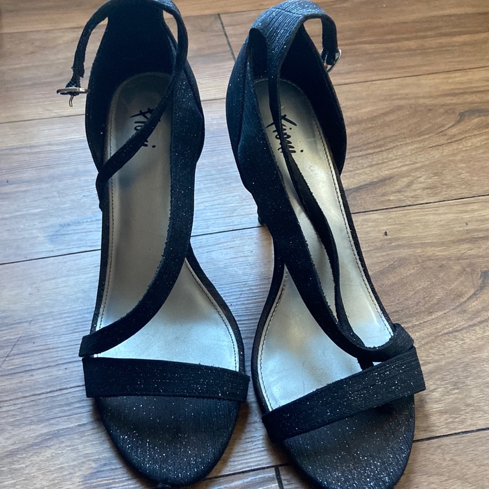 Black with sparkle high heels.